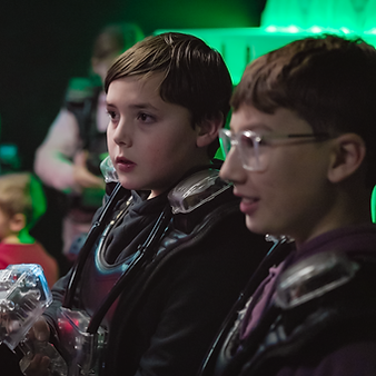 Friends playing laser tag at Grand Slam Family Fun Center near Minneapolis