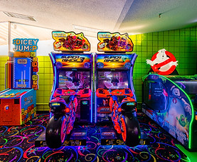 Families enjoying arcade games at Grand Slam Family Fun Center in Coon Rapids MN